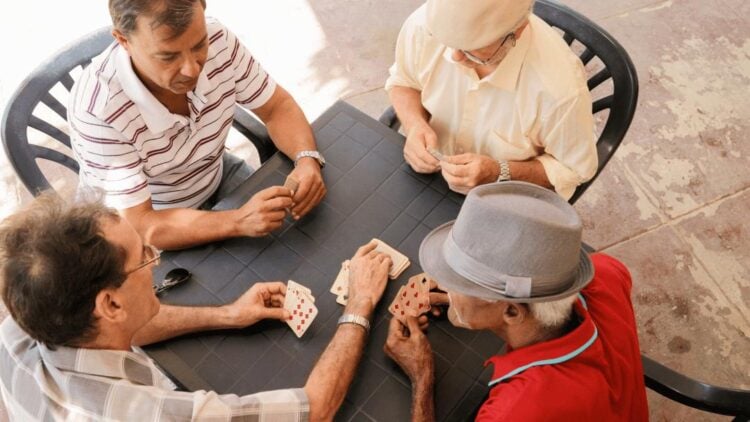 guys playing rummy game