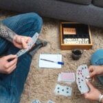 two people playing cards